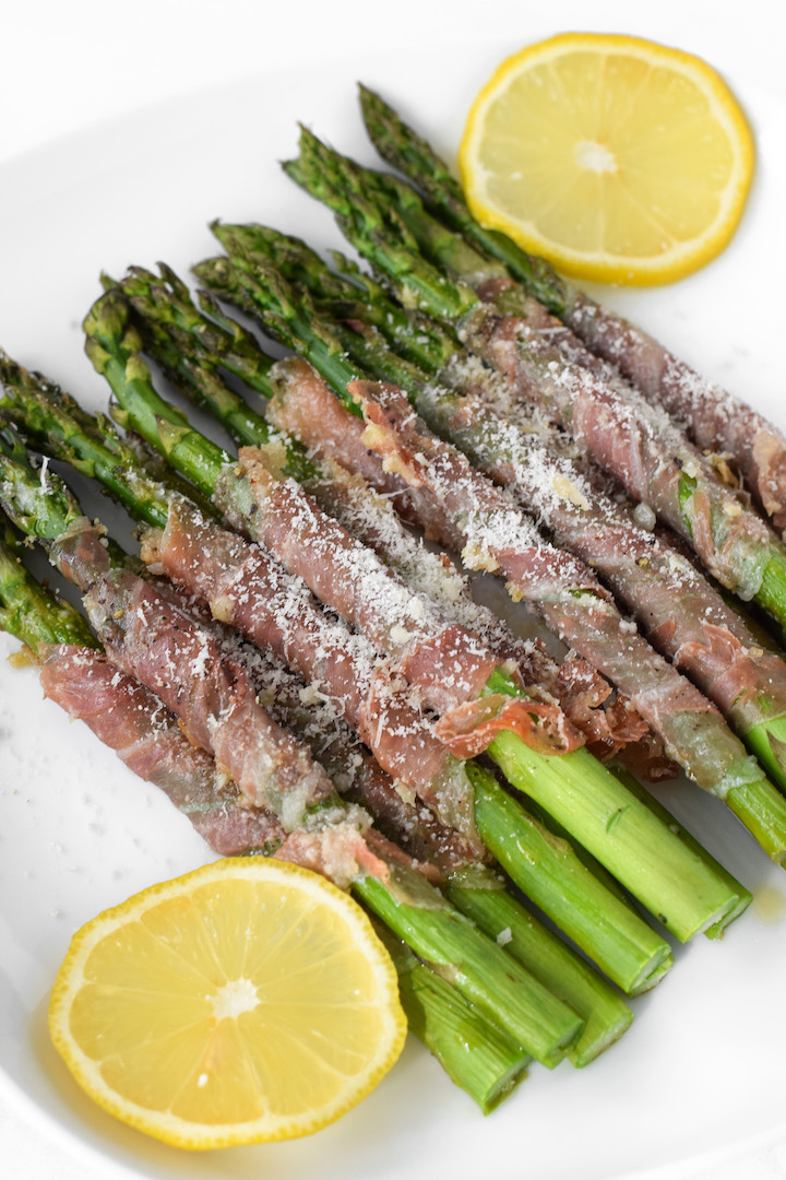 This prosciutto wrapped asparagus is the perfect summer side! It's crispy, salty, delicious, and gluten-free.