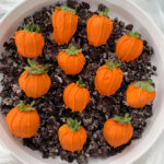 This cute little pumpkin patch dessert is made entirely from chocolate-covered strawberries. Fresh berries dipped in festive chocolate served on a bed of gluten-free cookie crumbs are sure to be a halloween party hit!