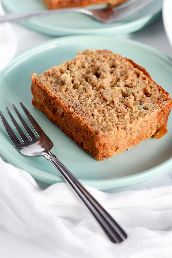 This one-bowl gluten-free banana bread recipe will be the best you've ever had. Super moist with no refined sugars and a dairy-free option, this healthy and delicious loaf is sure to be a hit!