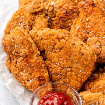 gluten free fried chicken pieces with a container of ketchup