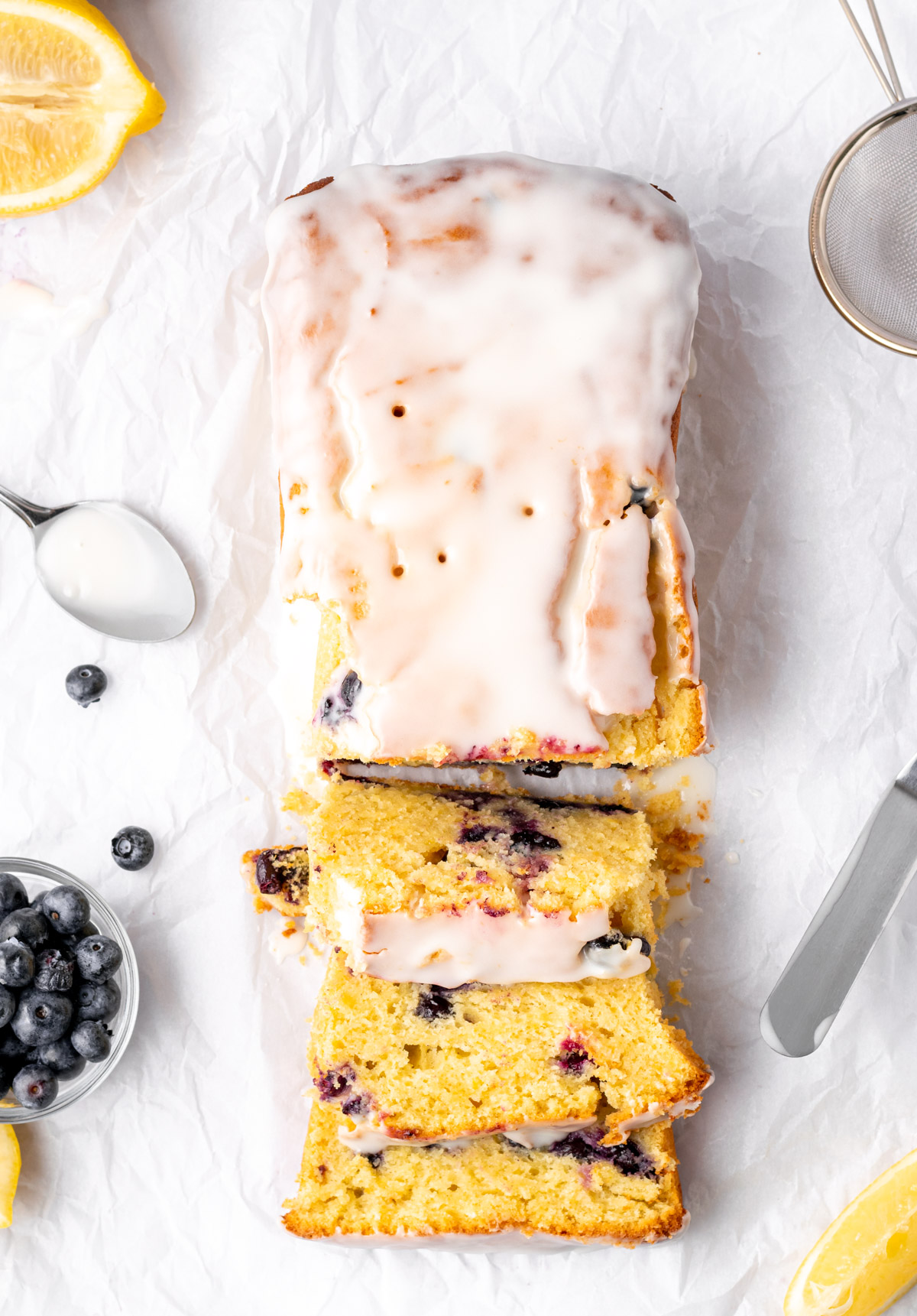 top view of a gluten free lemon blueberry loaf with 3 slices