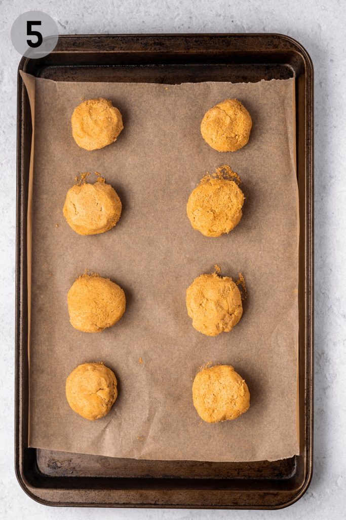 sugar cookie dough balls on a tray