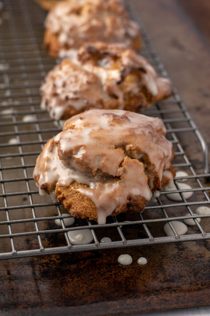 glazed air fried apple fritter on a wire rack