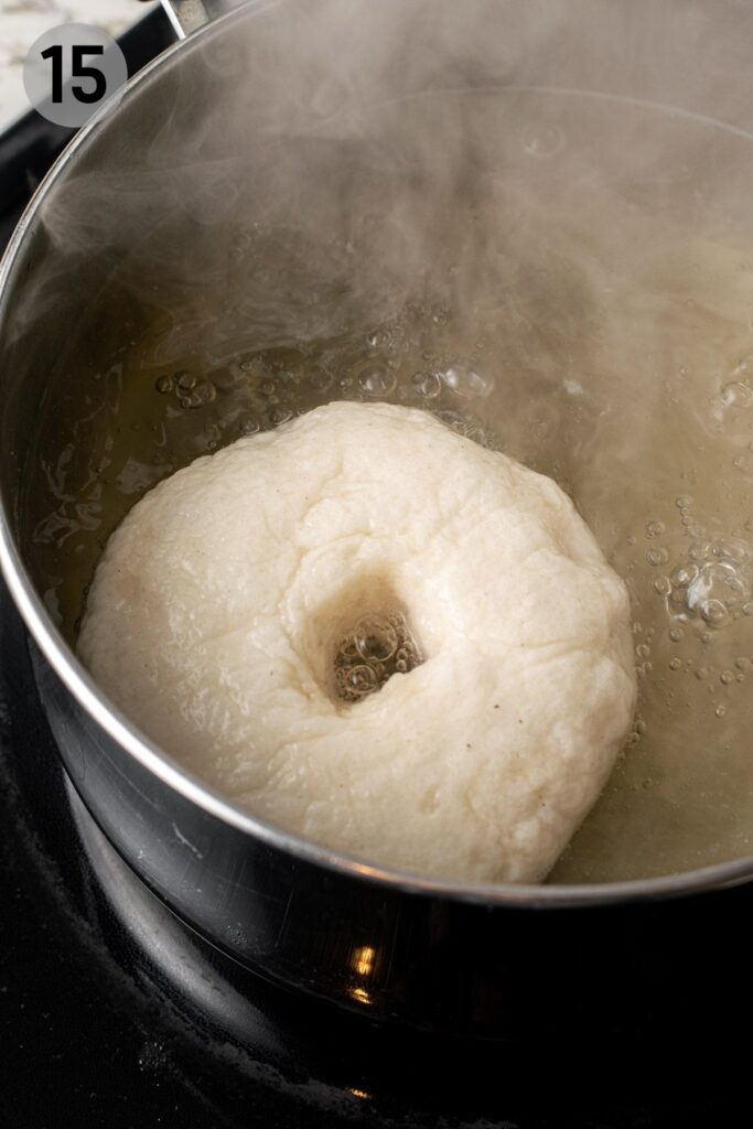 a gluten free bagel in boiling water