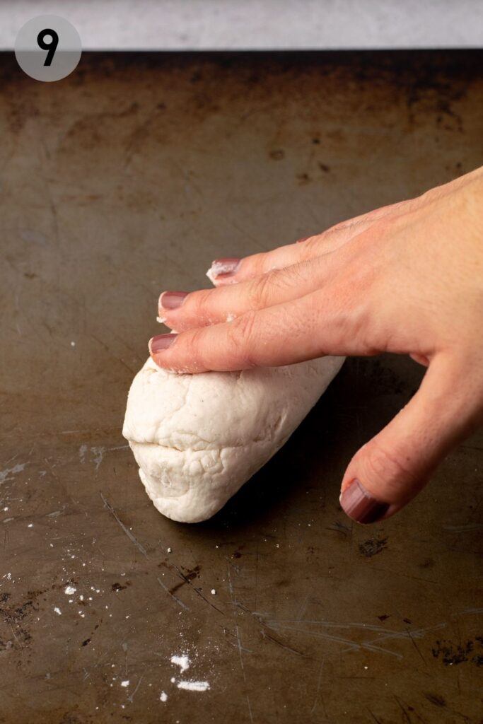 hand rolling bagel dough