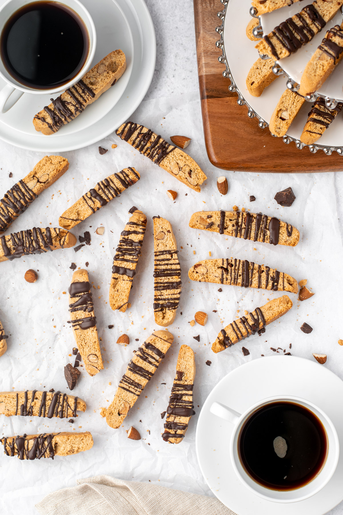 scattered biscotti and coffee cups