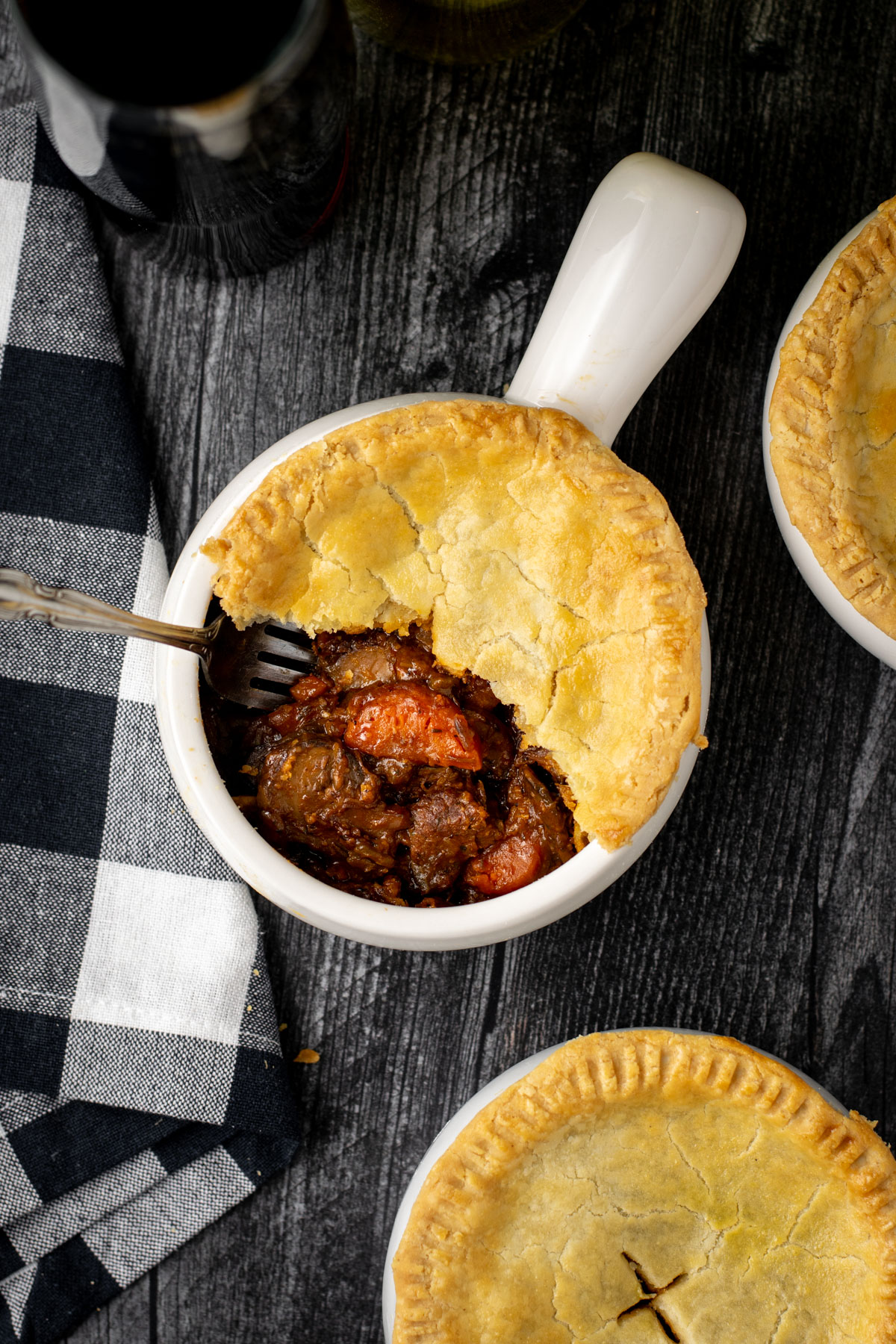 top view of steak and ale pie with a fork