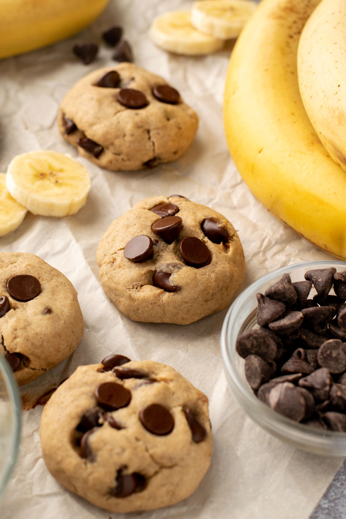 chocolate chip cookies with banana slices and chocolate chips around
