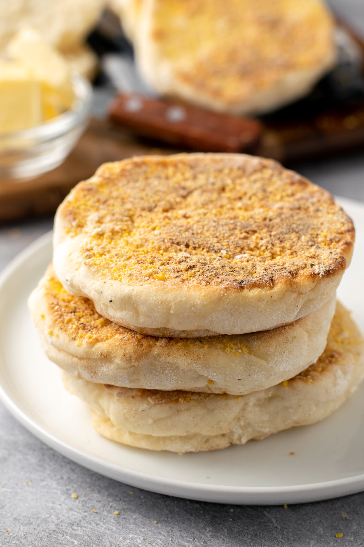 stack of 3 english muffins on a plate