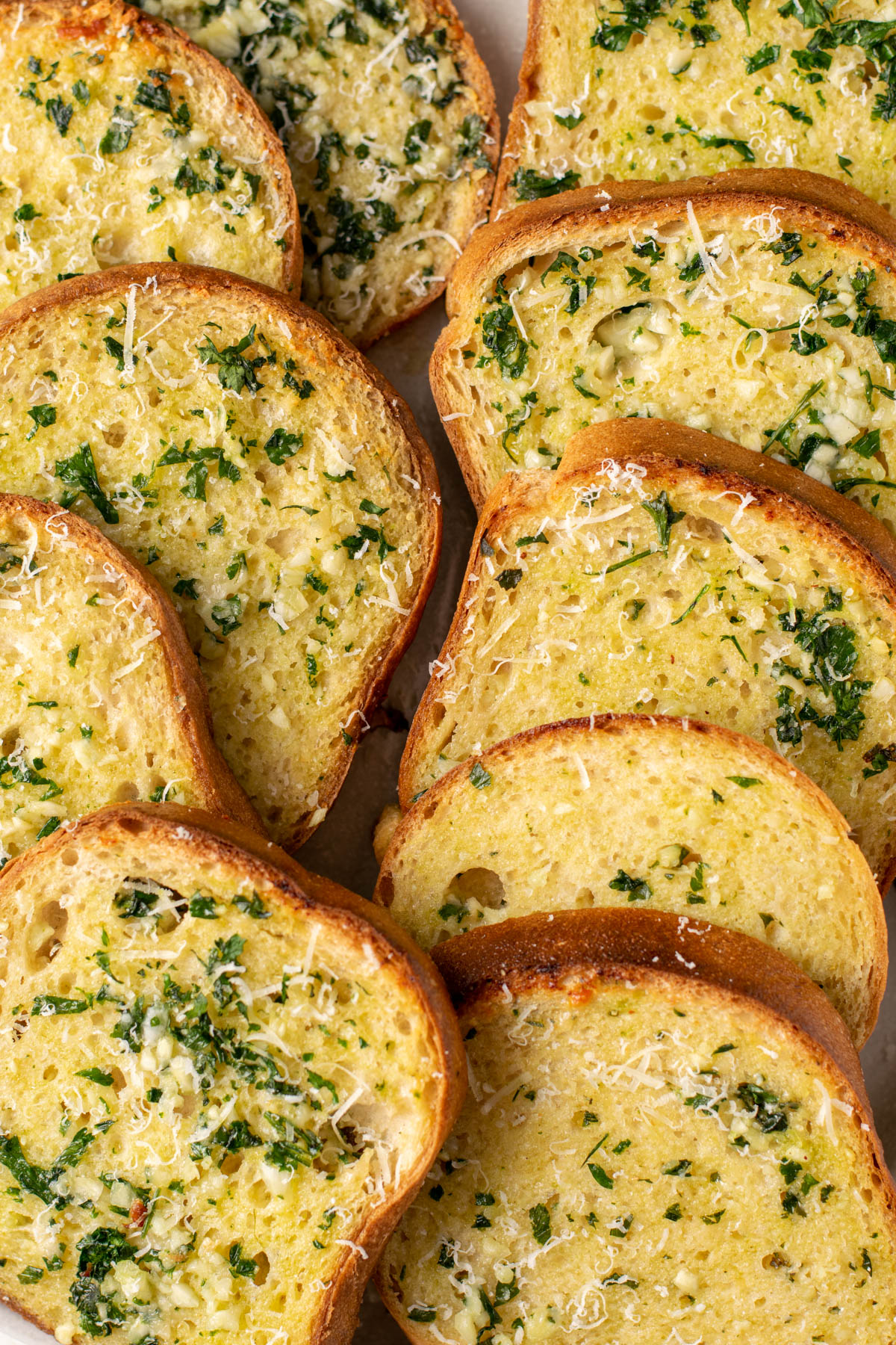 gluten free garlic bread slices laid out.