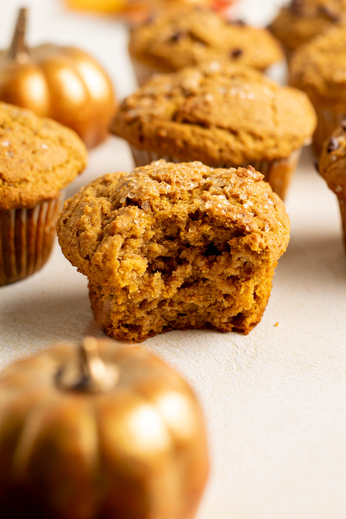 pumpkin banana muffin with a bite missing.