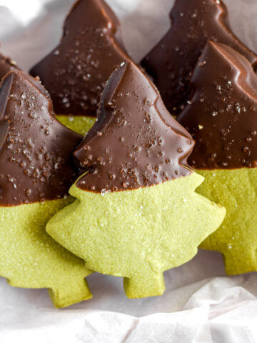 matcha shortbread cookies in the shape of trees.