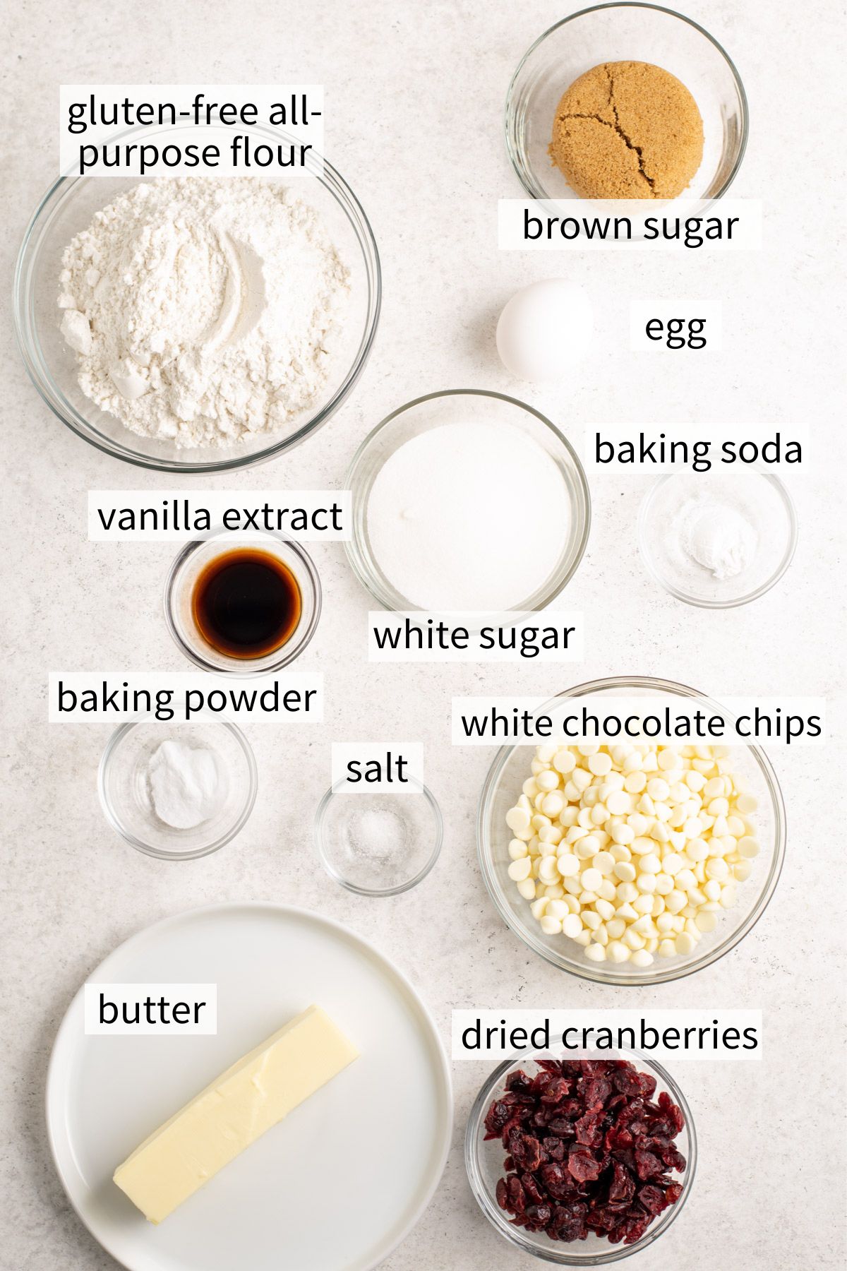 ingredients to make gluten free white chocolate cranberry cookies.